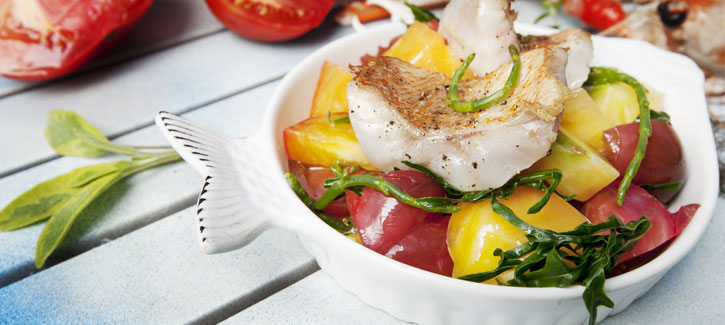 Rode snapperfilet met geroosterde tomaten en zeekraal