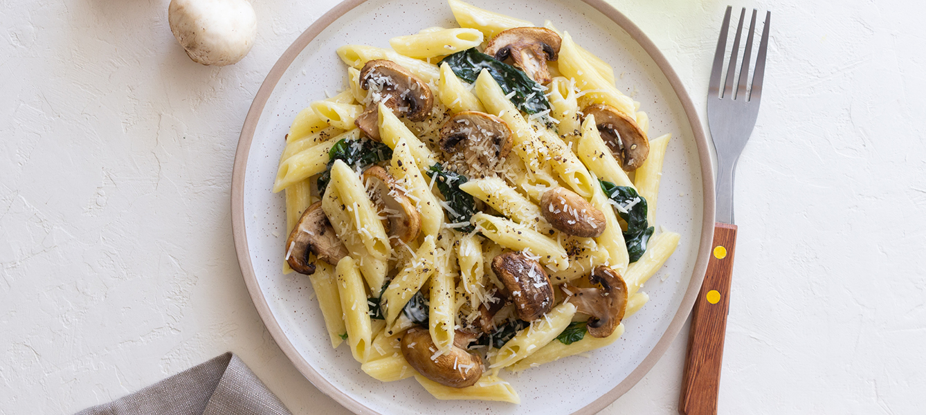 Pasta met champignons, spinazie en Parmezaan